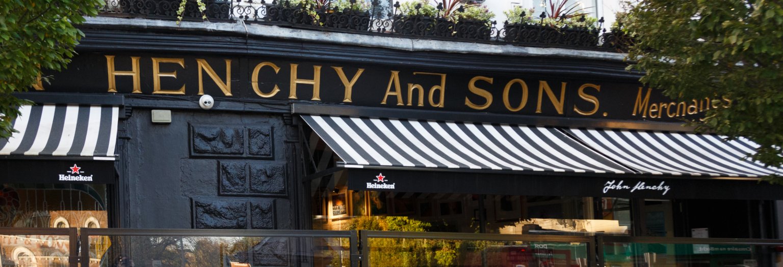 Henchy and sons bar logo above the awning