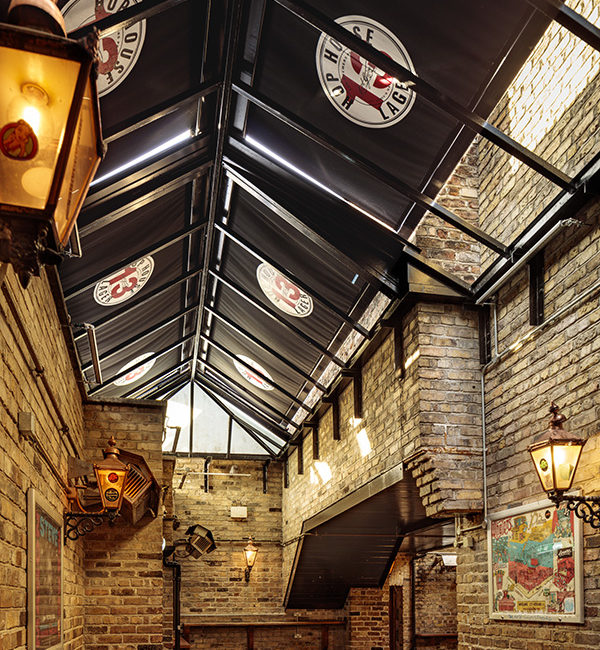 Whelans restaurant has brick walls and interesting ceiling made of verandasols